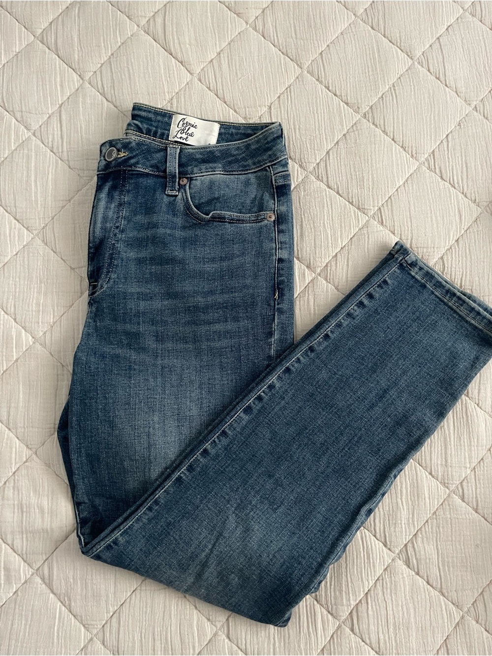 Cosmic Blue Love women’s jeans.
